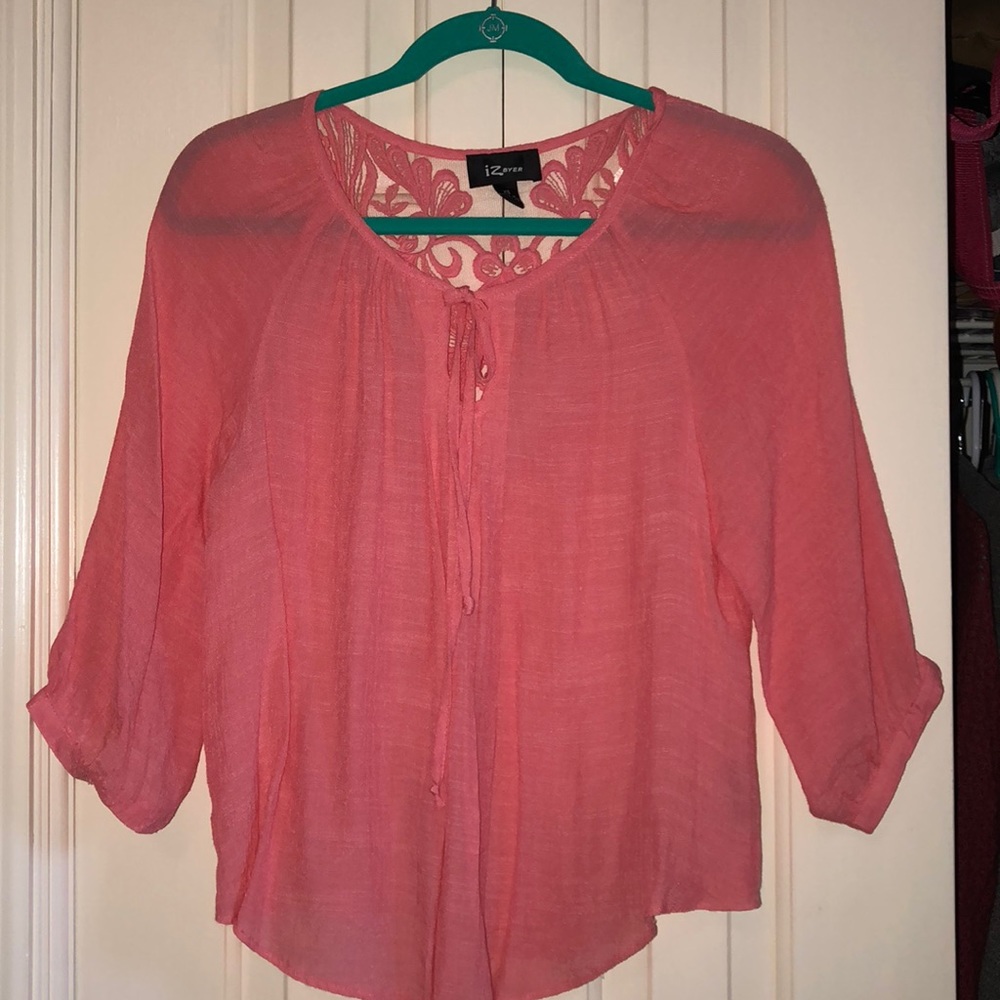 Pink blouse with floral design on back
